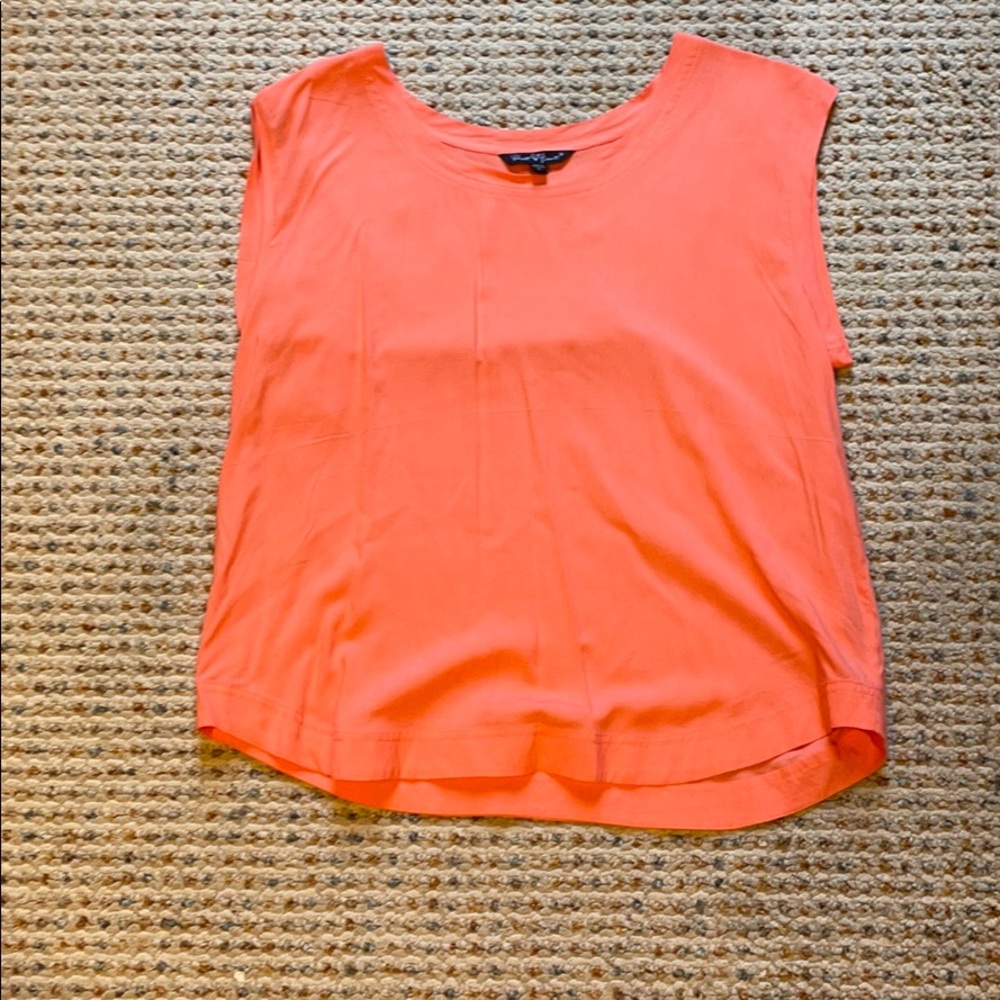 Peach sleeveless blouse